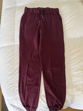 Women’s Lululemon Maroon Jogger Pants - size 2 or 4. (I can’t find size)
